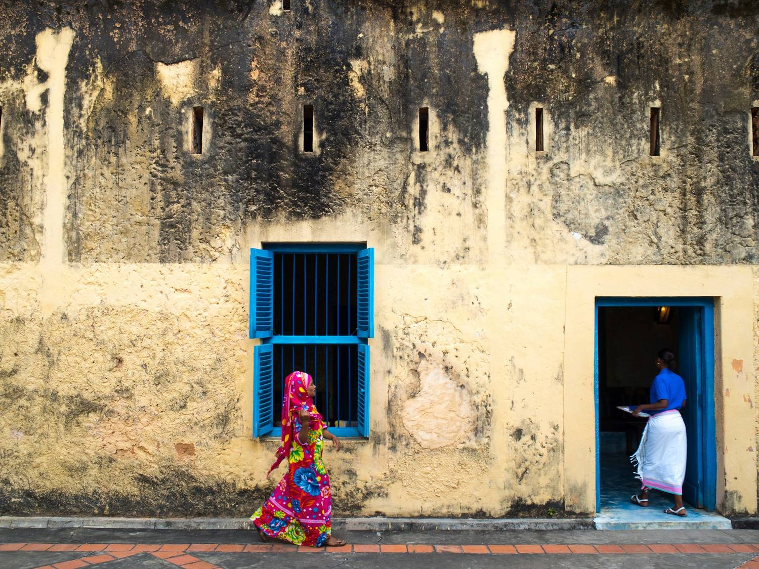 A portrait in the light of a Stone Town alley